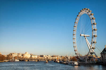 LONDON, UK - JANUARY 2, 2015: View of the London Eye. London Eye (135 m tall, diameter of 120 m) - a famous tourist attraction over river Thamesのeditorial素材