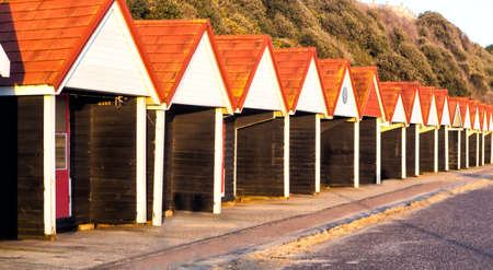 BOURNEMOUTH, UNITED KINGDOM  DECEMBER 23: Beach huts on December 23, 2014. Beach huts have been a prominent feature of the seafront at Bournemouth since the 1930s.のeditorial素材