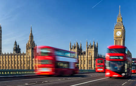 Big Ben, Westminster Bridge and red double decker bus in London, England, United Kingdomの写真素材