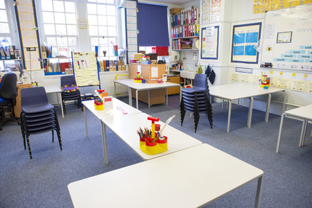 A horizontal image of an empty primary school classroom. The setting is typically British.の写真素材