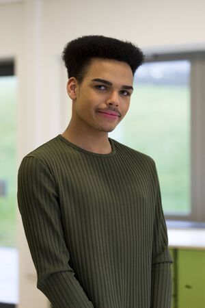 Portrait of a teenage boy at school.の写真素材