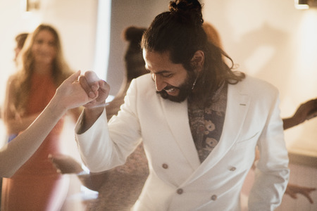 Groom is dancing with his new wife at his wedding. の写真素材