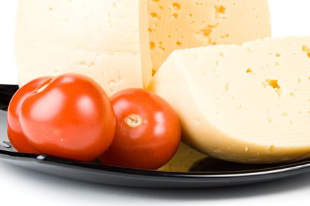 Fresh appetizing cheese on a white background