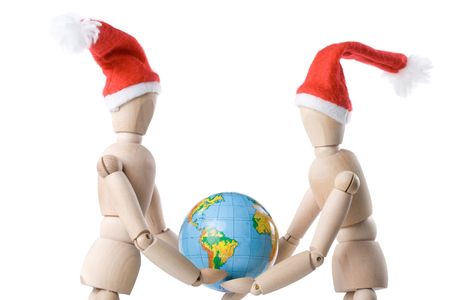 Two little wooden men with globe on a white backgroundの写真素材