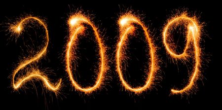 Inscription 2009 made by sparkler on a black backgroundの写真素材
