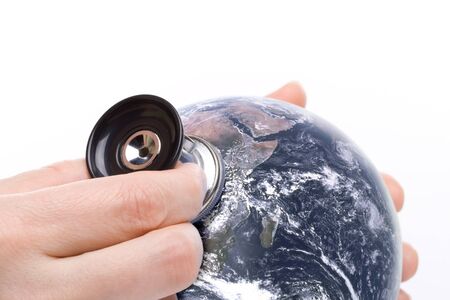 Globe with stethoscope on a white backgroundの写真素材