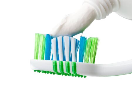 Tooth-brush and tooth-paste on a white background