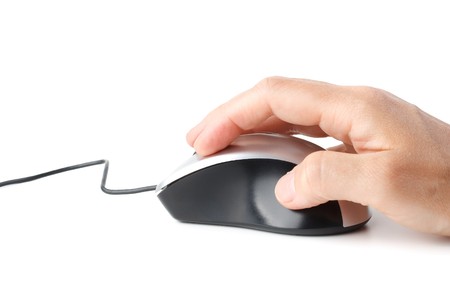 Modern computer mouse and hand on a white backgroundの写真素材