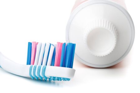 Tooth-brush and tooth-paste on a white background