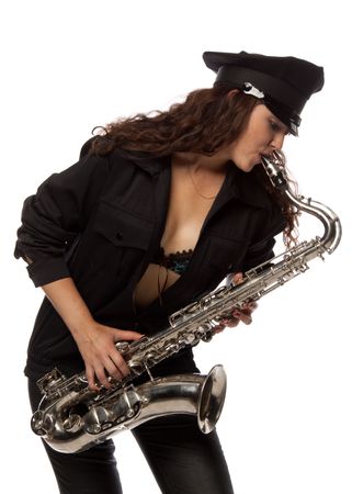 Sexy girl in a uniform of the security guard with a saxophone on a white ackgroundの写真素材