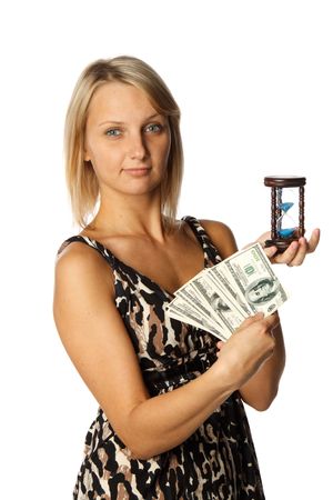 Young businesswoman holding a hourglass and money on  a white  background. Time is money concept.