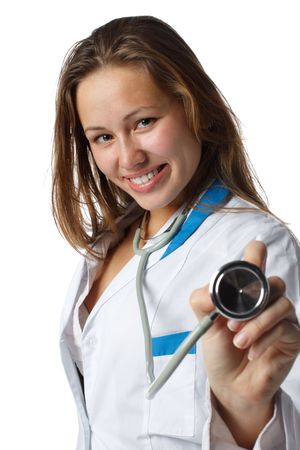 Smiling beautiful doctor with stethoscope on a  white background. Medical concept. Selective focus.の写真素材