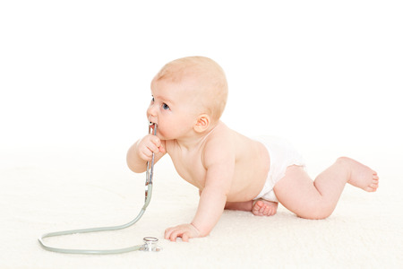 Sweet baby with stethoscope on a  white background.の写真素材