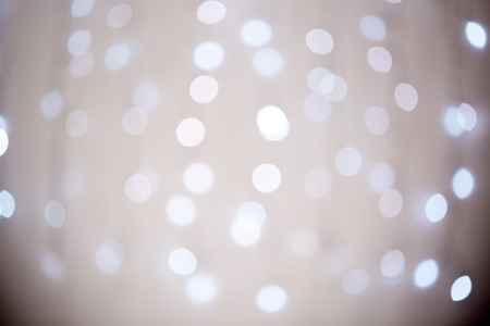 Abstract grey background with holiday lights.の写真素材