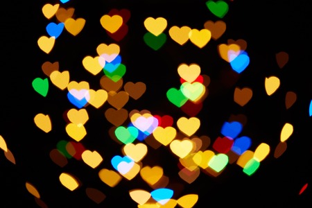 heart-shaped abstract bokeh background. shallow DOF.  Design element for romantic greeting card, wedding invitation, Valentine's Day cardの写真素材