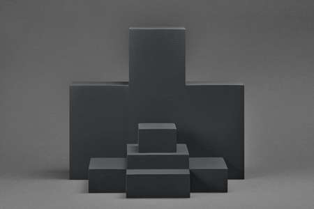 Set of rectangular parallelepipedes on a gray background. Abstract background with copy space and...