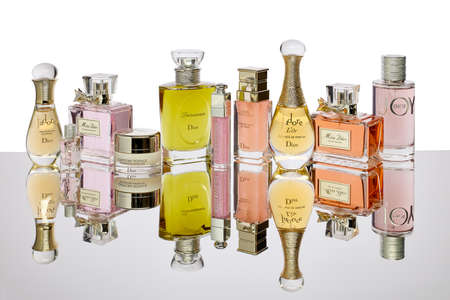 St.Petersburg, Russia - March 2020 - Collection of perfumes and cosmetic products from Dior on white...
