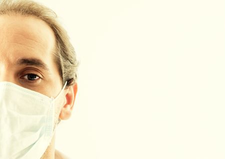 Doctor closeup with flu maskの写真素材