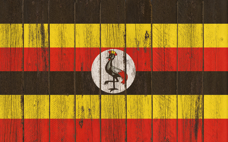 Flag of Uganda painted on wooden frameの写真素材