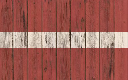 Flag of Latvia painted on wooden frameの写真素材