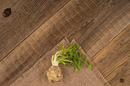 Celery root on the old wooden backgroundの写真素材