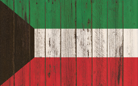 Flag of Kuwait painted on wooden frameの写真素材
