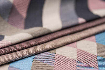 Colorful upholstery fabric samples background. Abstract background, empty template.