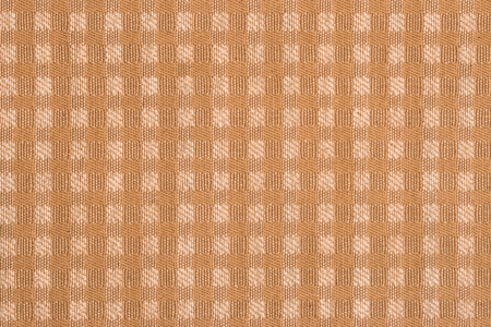 abstract background and texture of fabric closeup with a checkered pattern brown color. Abstract...