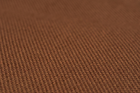 Brown fabric texture. Abstract background, empty template. Selective focus.の写真素材
