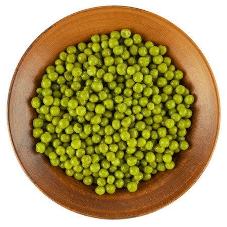 Marinated green peas in bowl isolated on white background. Top view.の写真素材