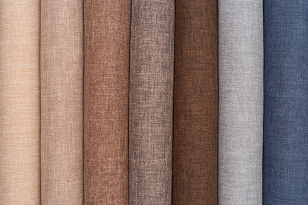 A set of samples of fabric furniture decoration lines of textile textures. Multicolored stripes...