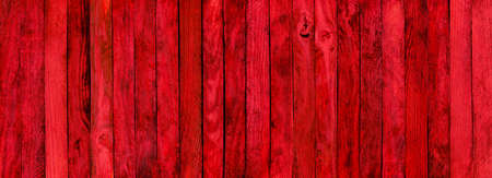 Red wood texture. Background old red panels. Top view.の写真素材