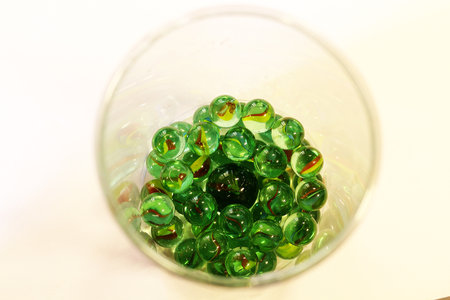 marbles in a container.の写真素材