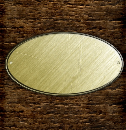 metal sign on wood plank backgroundの写真素材
