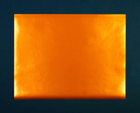 orange foil on black paper