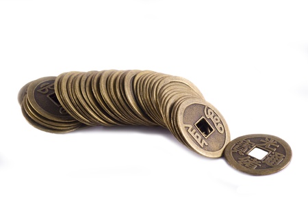 old heap china coins isolated on whiteの写真素材