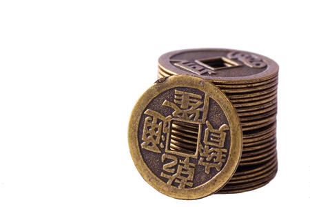 three old china coins isolated on whiteの写真素材