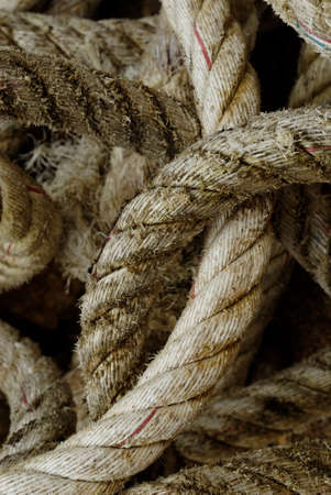 Weathered Rope beside a boat at a wharf in the Philppines