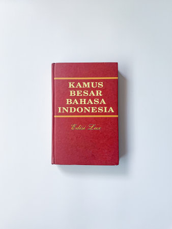 Yogyakarta, Indonesia, 26 Jan 2023 - A photograph of a large Indonesian dictionary book with a red...