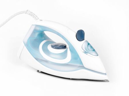 Steam iron isolated on white background の写真素材