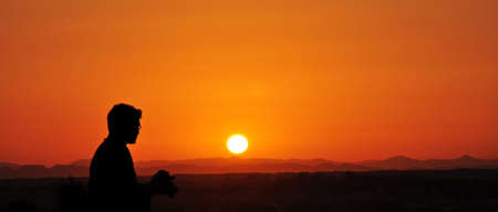 An image of a nice desert sunsetの写真素材