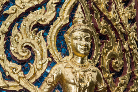 The metal columns of Thai temple's relief art.の写真素材