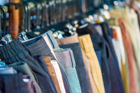 A second handed clothes shop in Thai urban village market on March 6, 2014 in Nakornsrithammarat, Thailand.のeditorial素材