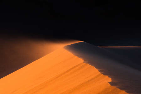 Close up of sand dune moved by the wind , desert of Saharaの写真素材