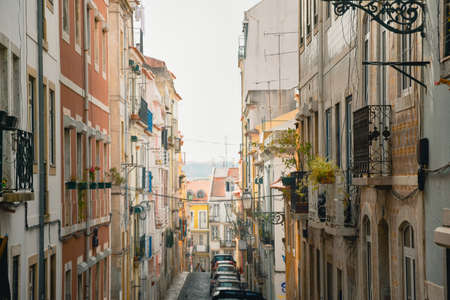 Balconies of old buildings in a colorful street in the Chiado neighborhood and Alto neighborhood. Lisbon, Portugal. Europe.の写真素材