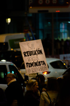 MADRID, SPAIN - MARCH 8, 2019: Massive feminist protest on 8M in favour of women's rights and equality in society. Protest posters could be seen during the demonstration, in Madrid, Spain on March 8, 2019のeditorial素材