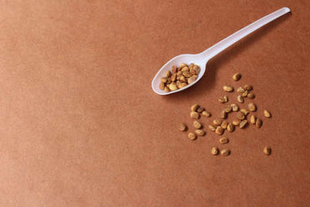 Chironji seeds on brown backgroundの写真素材