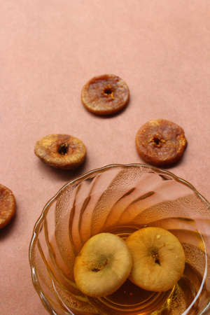 Dried figs and figs soaked in waterの写真素材