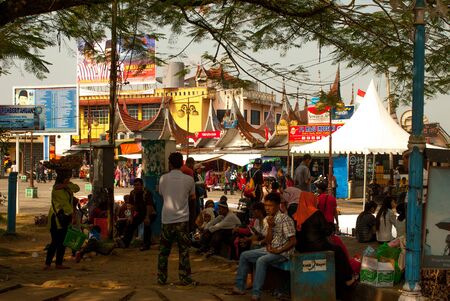 Bukit tinggi, Indonesia - August 23, 20015 - People resting in the shade on squareのeditorial素材