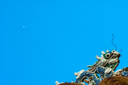 Dragon decor on pavilion in garden of Citadel in Hue. Vietnam.の写真素材